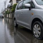 車のタイヤがパンクしたときのイメージ
